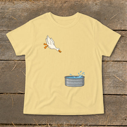 Yellow t-shirt with a cartoon duck jumping into a galvanized tub of water.