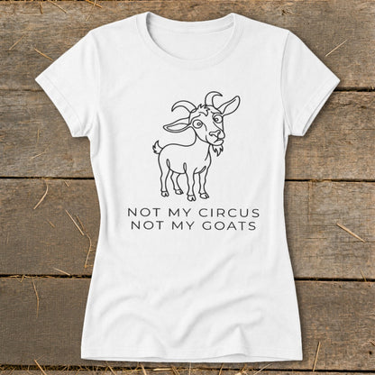 White t-shirt with line art of a goat and text "Not My Circus Not My Goats".