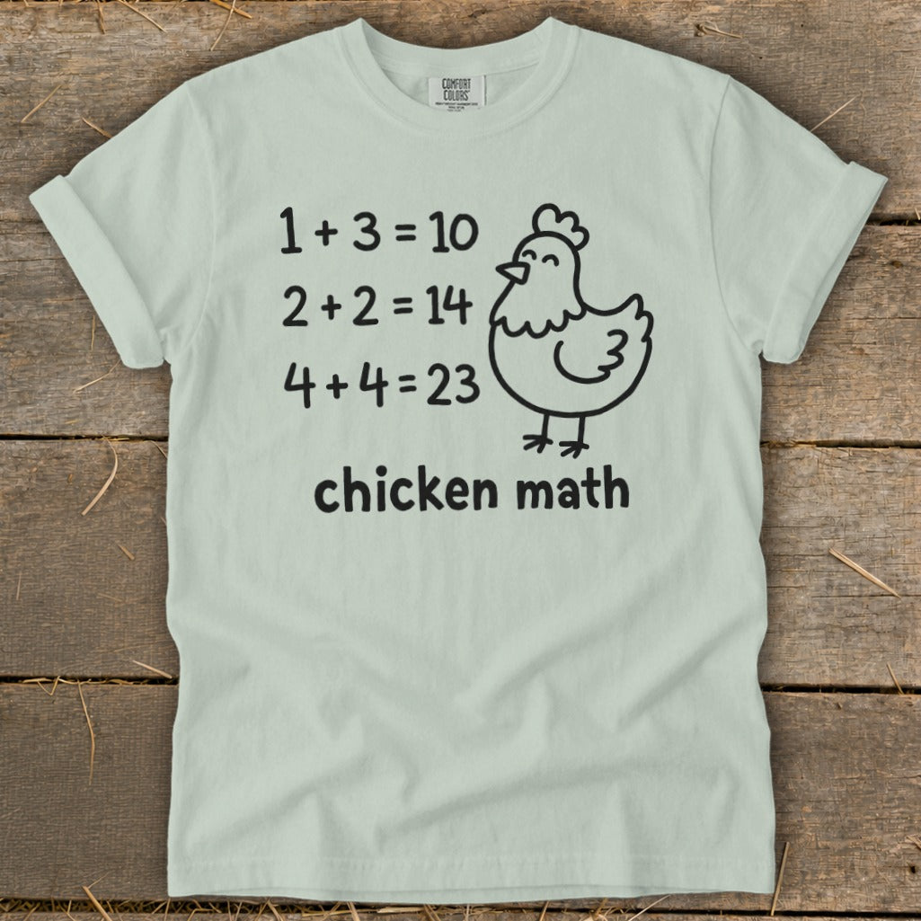 Light green t-shirt with "chicken math" and humorous math equations featuring a chicken illustration.
