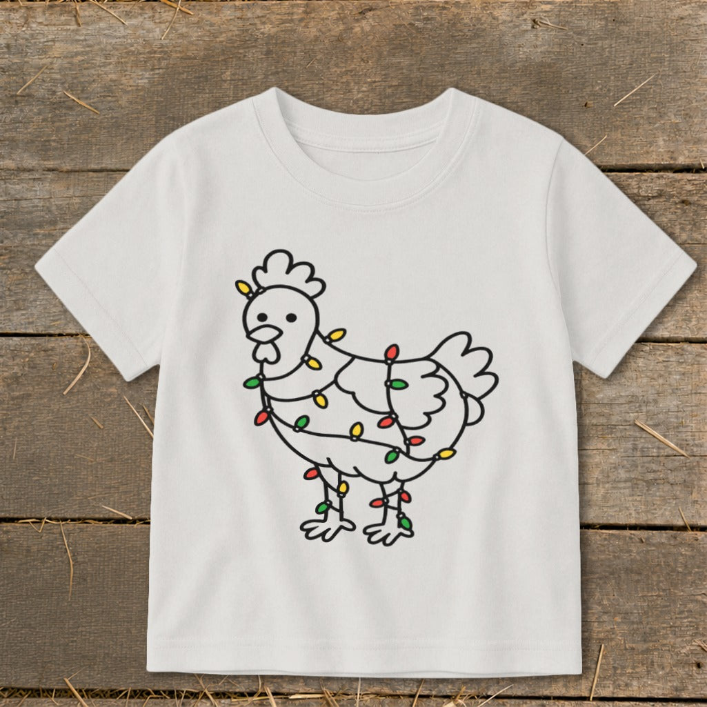 White t-shirt with a cartoon chicken design wrapped in colorful holiday lights.
