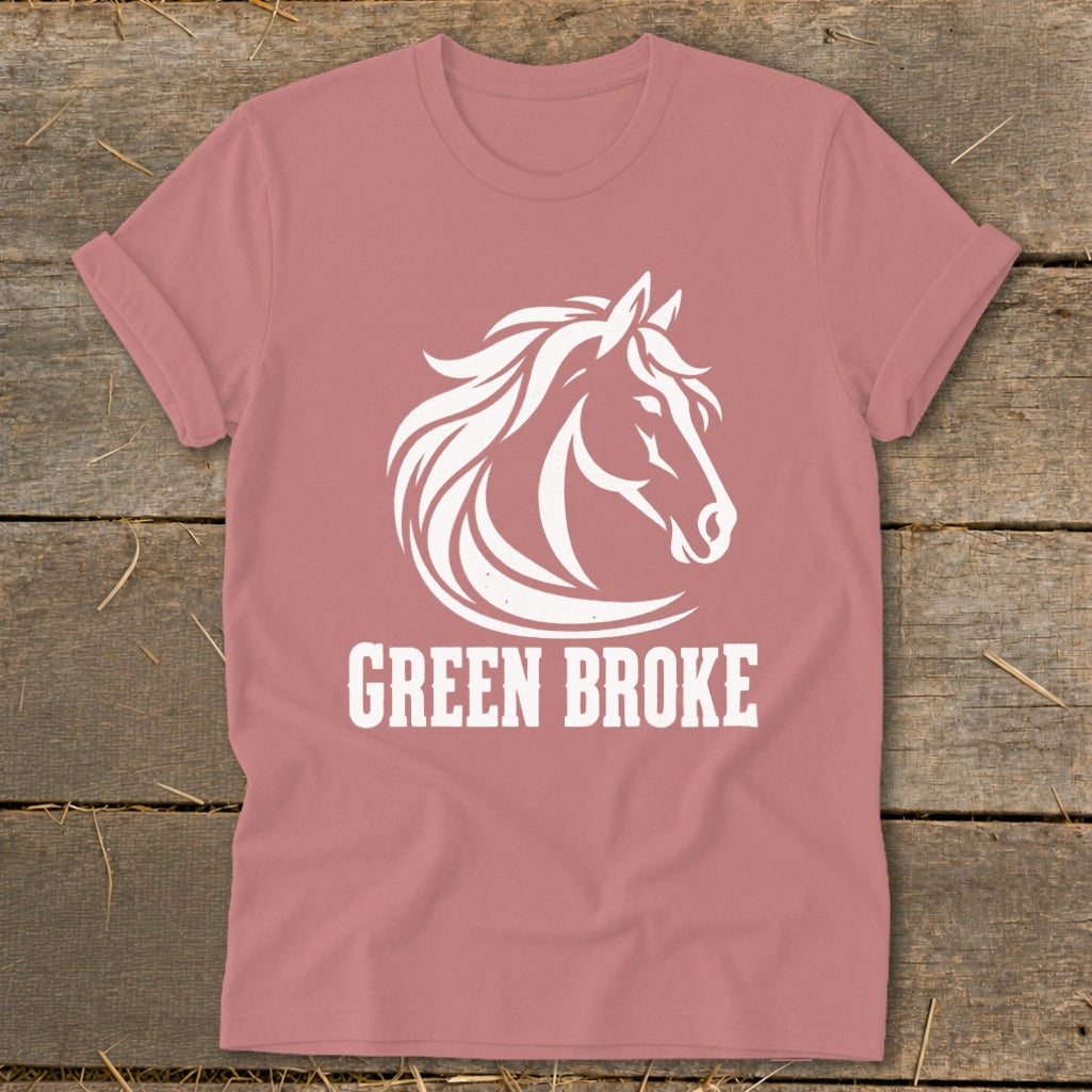 Mauve short-sleeve t-shirt with a white graphic of a horse's head and the text GREEN BROKE.