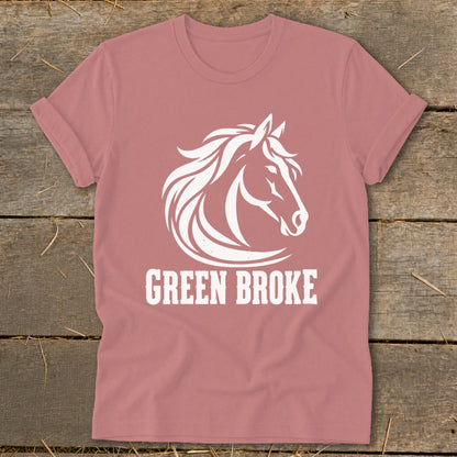 Mauve short-sleeve t-shirt with a white graphic of a horse's head and the text GREEN BROKE.