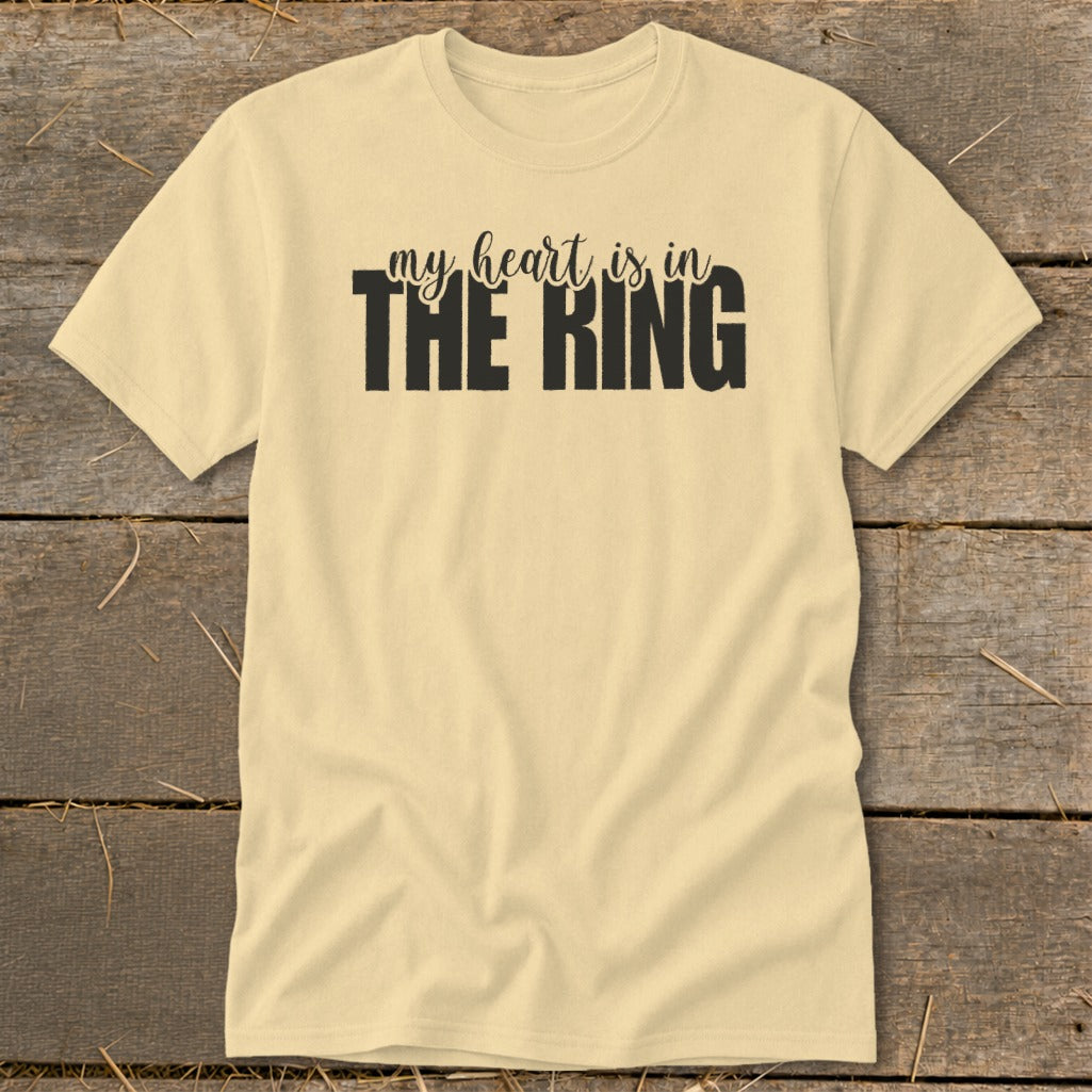 Pale yellow t-shirt with black text that reads "my heart is in THE RING".