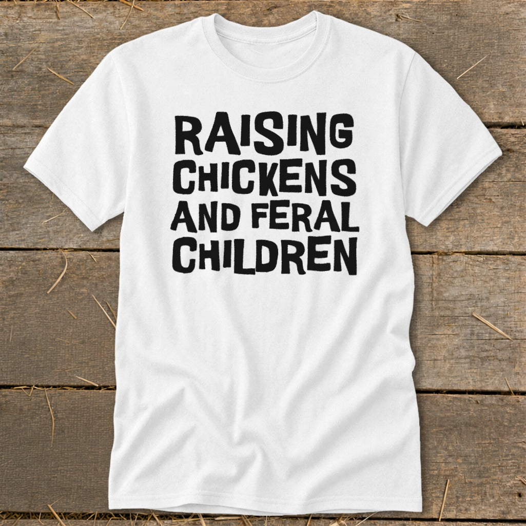 White t-shirt with black text: "RAISING CHICKENS AND FERAL CHILDREN".