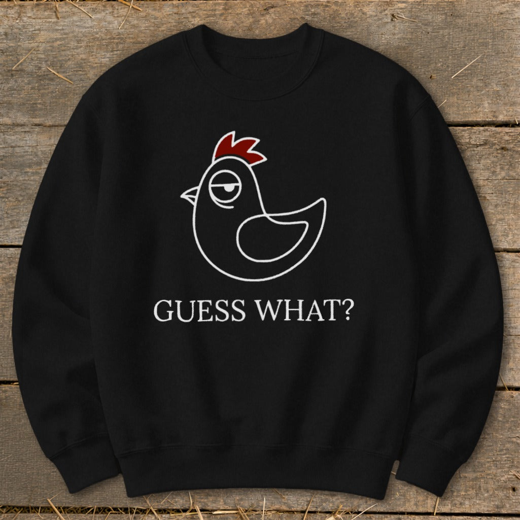 Black sweatshirt with a white outline chicken graphic and text "GUESS WHAT?".