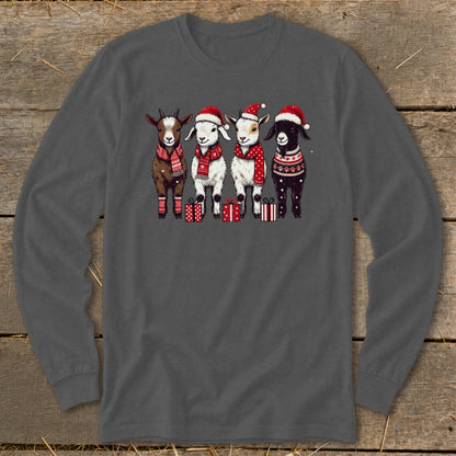 Four goats wear Santa hats, scarves, and holiday sweaters with presents.