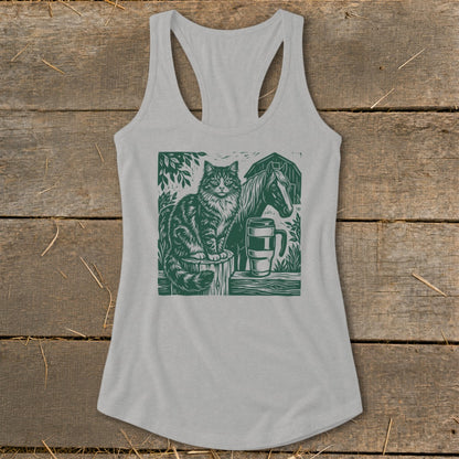 Gray tank top featuring a green linocut print of a cat and horse by a barn.