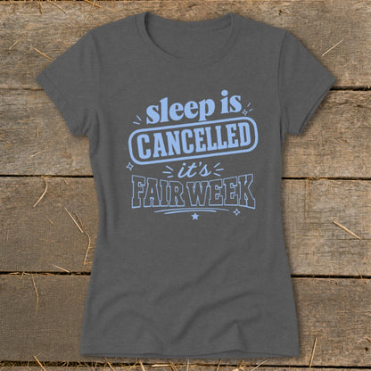 Gray t-shirt with light blue text reading "sleep is CANCELLED it's FAIR WEEK".