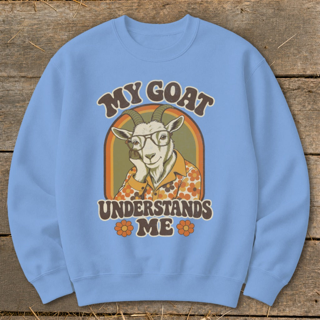 Light blue sweatshirt with a vintage graphic of a goat wearing glasses and the text "MY GOAT UNDERSTANDS ME".