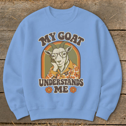 Light blue sweatshirt with a vintage graphic of a goat wearing glasses and the text "MY GOAT UNDERSTANDS ME".