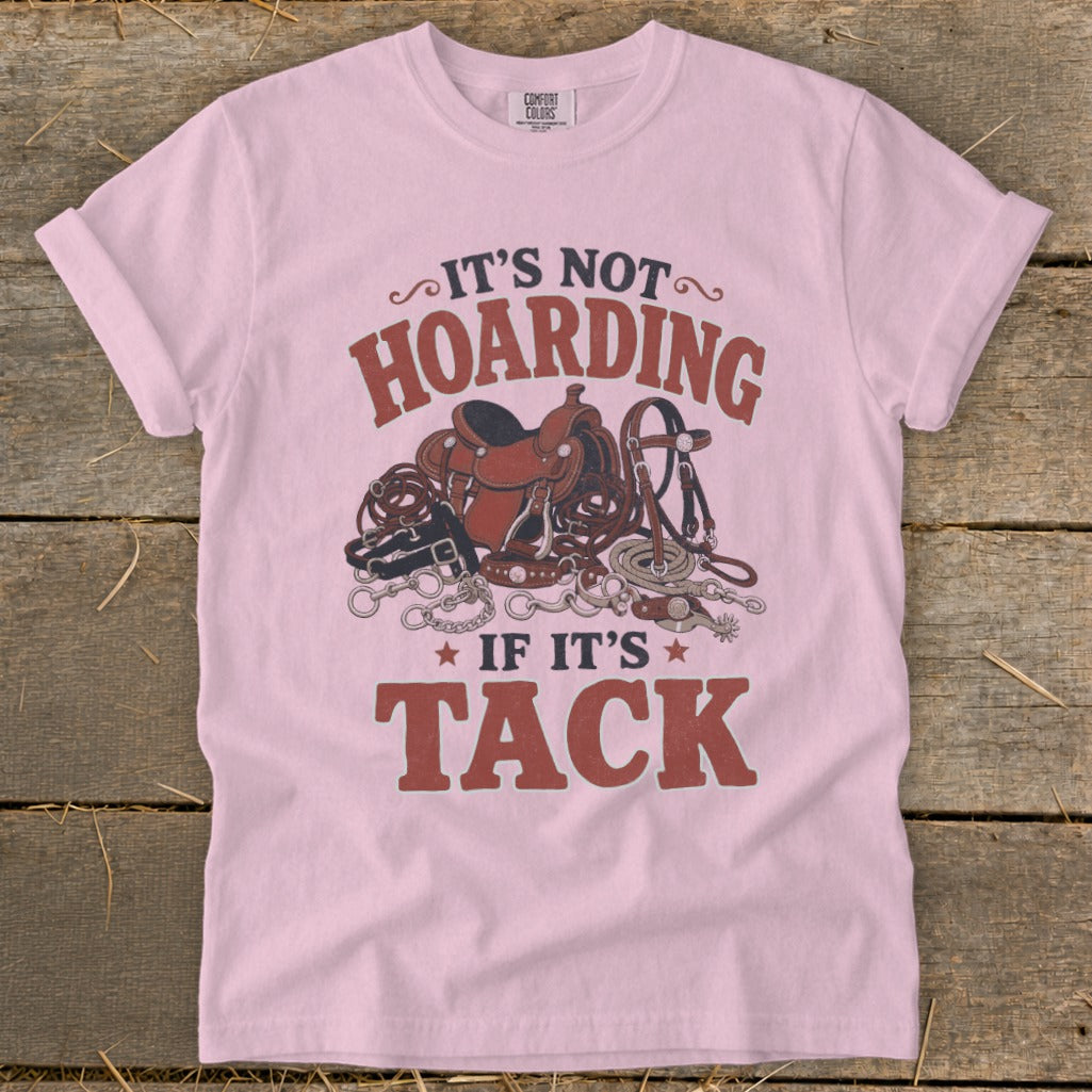Pink t-shirt with "It's not hoarding if it's tack" and horse tack graphic.