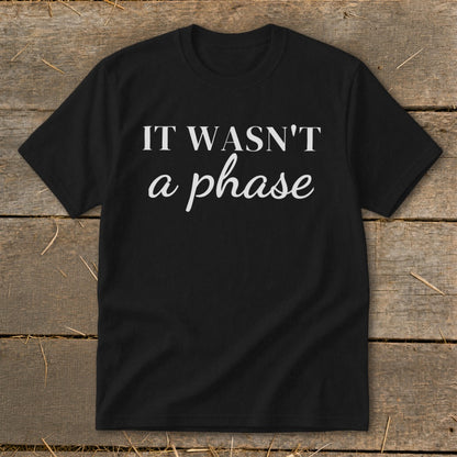 Black t-shirt with white text "IT WASN'T a phase".