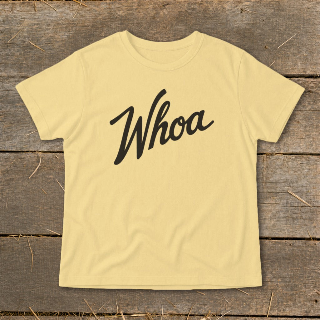 Yellow t-shirt with "Whoa" printed in black cursive text.