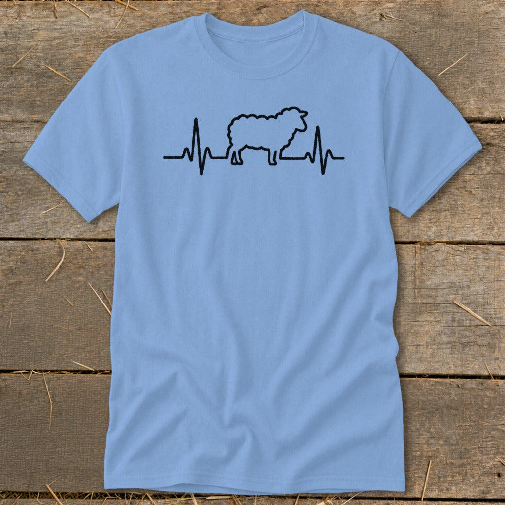 A light blue t-shirt with a black graphic of a sheep integrated into a heartbeat line.