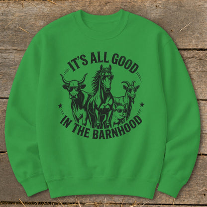 Green sweatshirt with black graphic of cow, horse, goat, and pig wearing sunglasses.