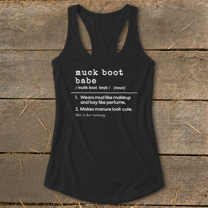 Black tank top with "muck boot babe" definition and humorous bullet points.