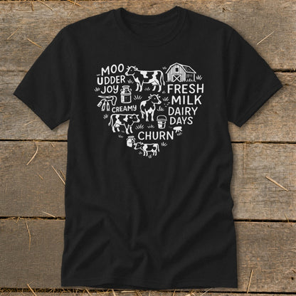 Black t-shirt with heart-shaped graphic of cows, milk jugs, and farm text.