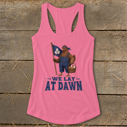 Pink tank top with chicken graphic and text "We Lay At Dawn".