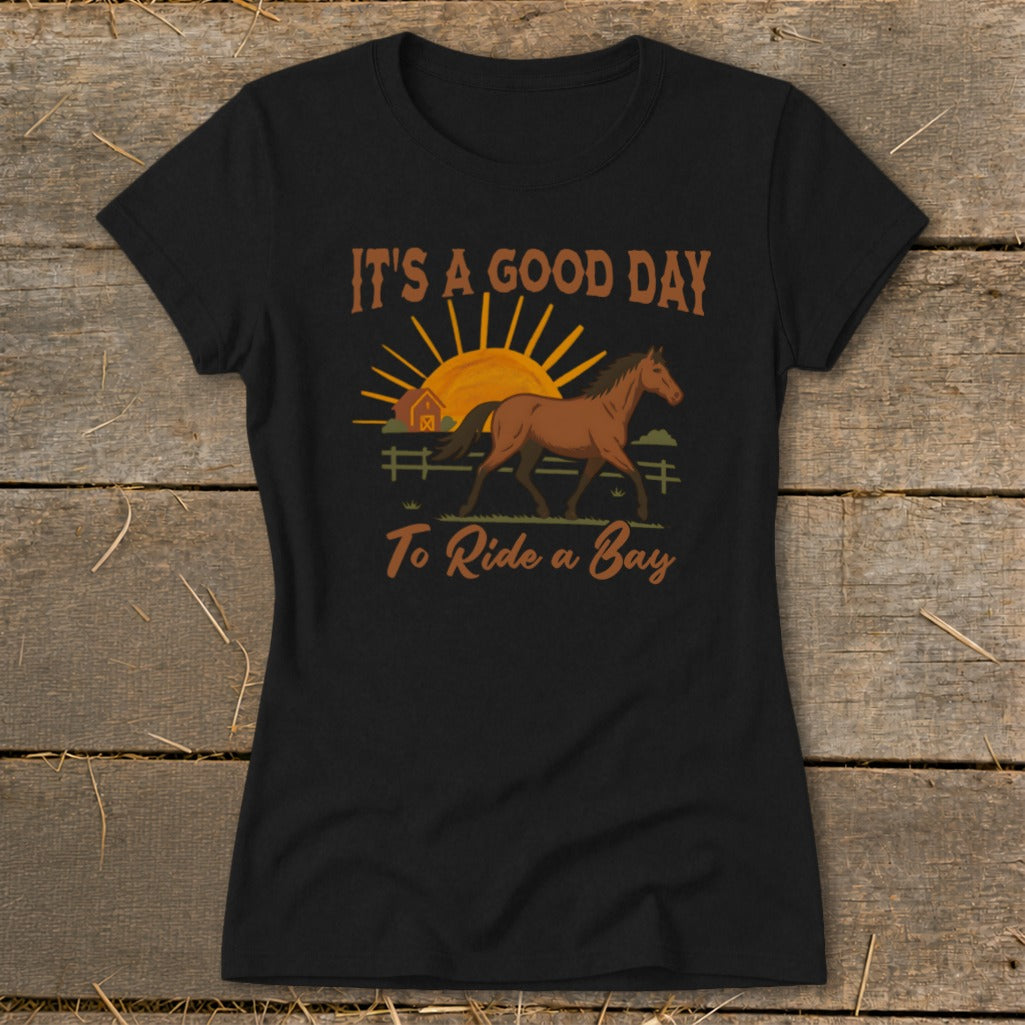 Black t-shirt with "It's a Good Day To Ride a Bay" text and horse graphic.