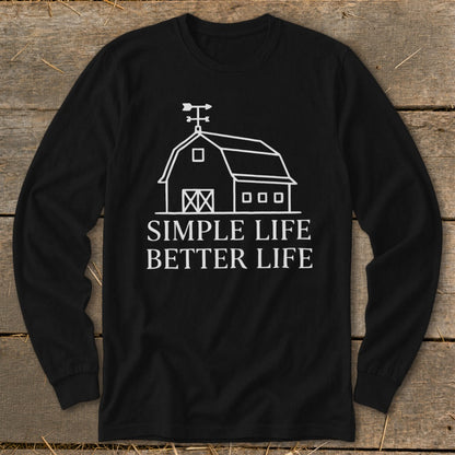 Black long-sleeved shirt with a white line drawing of a barn and the text "SIMPLE LIFE BETTER LIFE."