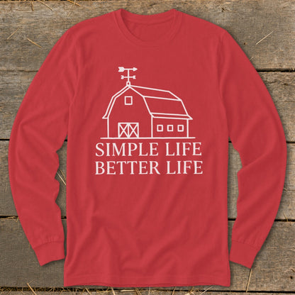 Red long-sleeve shirt with white barn graphic and text: "SIMPLE LIFE BETTER LIFE".