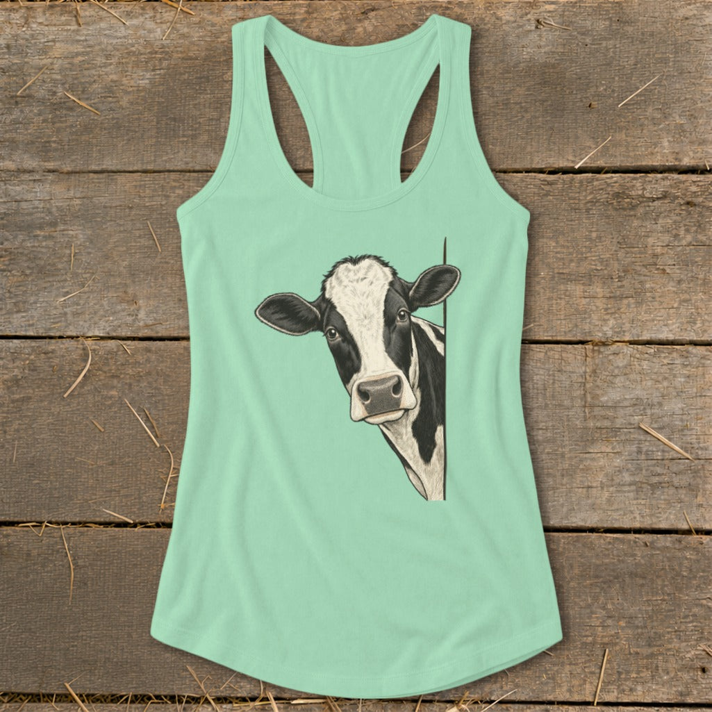 Mint green tank top with a black and white cow peeking from the side.