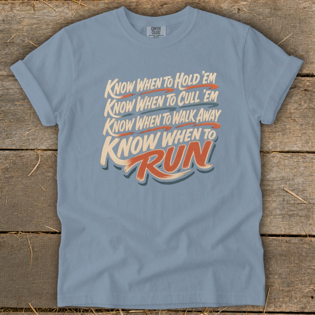Light blue t-shirt with text "Know When To Hold 'Em", "Know When To Cull 'Em", "Know When To Walk Away", "Know When To Run".