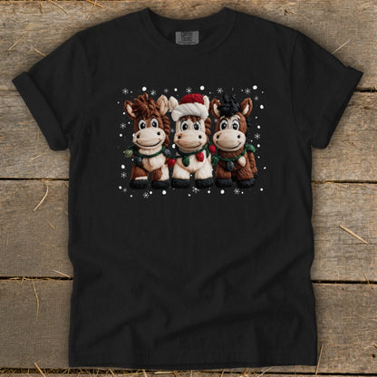 Three cartoon horses wearing Christmas decorations and a Santa hat.