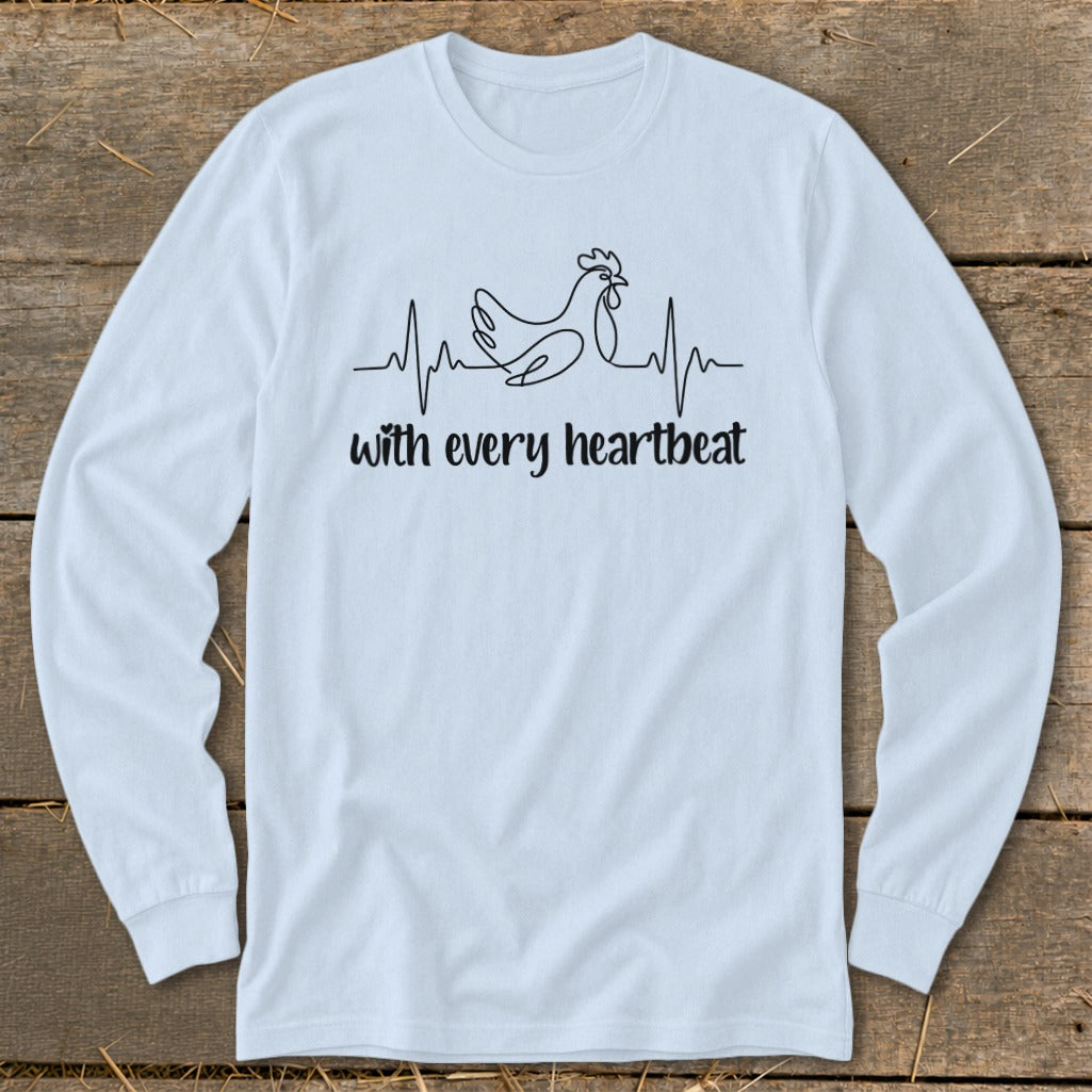 Light blue long-sleeve shirt with a line drawing of a chicken on a heartbeat line and text.