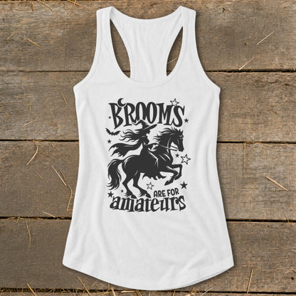 White tank top with "Brooms are for amateurs" Halloween graphic featuring a witch on a horse.