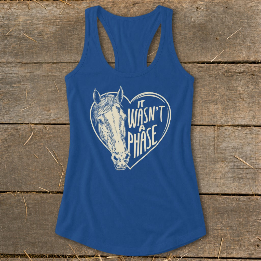 Blue racerback tank top with horse head inside a heart and "It wasn't a phase" text.