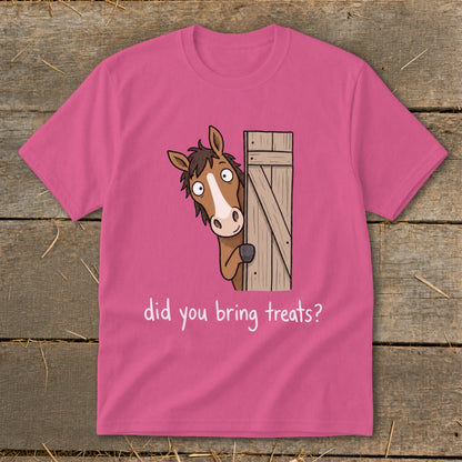 Pink t-shirt with cartoon horse peeking from behind a wooden door, asking "Did you bring treats?".