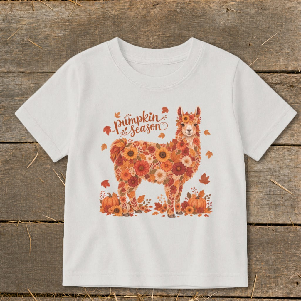 White t-shirt with a floral llama and "pumpkin season" text.