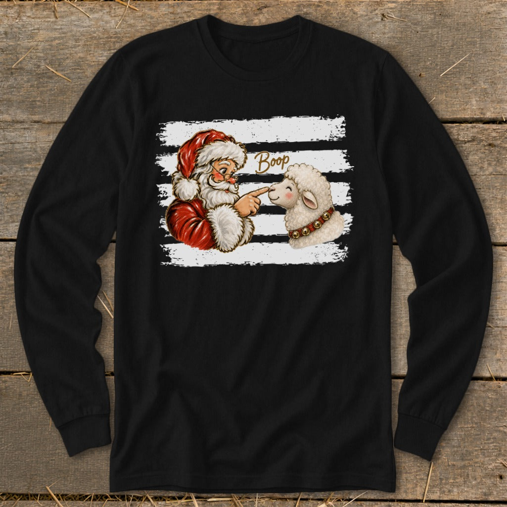 Santa Claus booping a sheep with the text "Boop" on a black long-sleeve shirt.