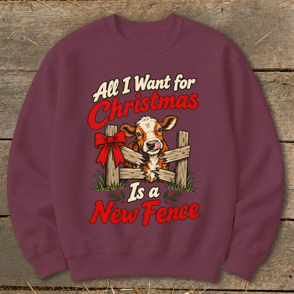 Burgundy sweatshirt with a cow behind a fence, text "All I Want for Christmas Is a New Fence".