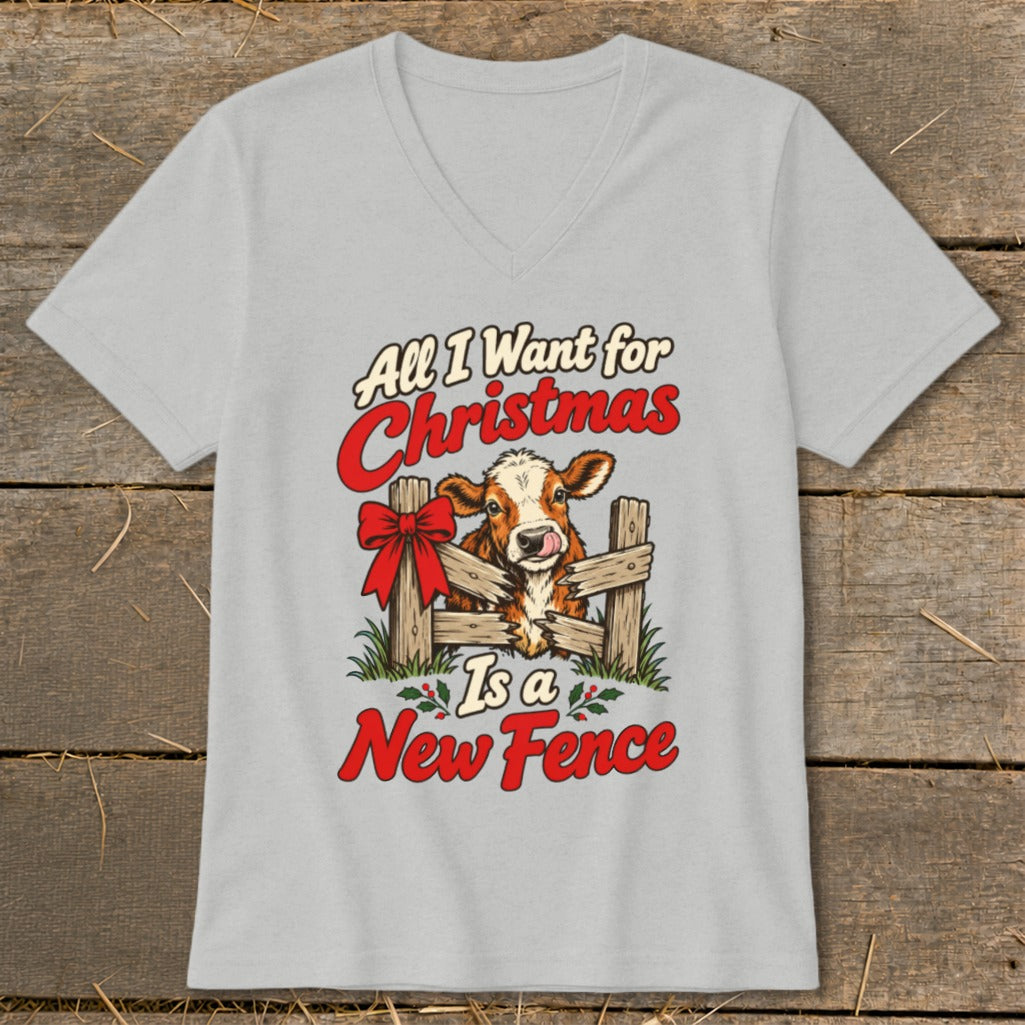 Cow through fence text: "All I Want for Christmas Is a New Fence"