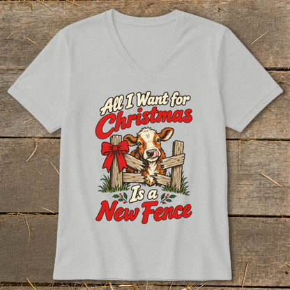 Cow through fence text: "All I Want for Christmas Is a New Fence"