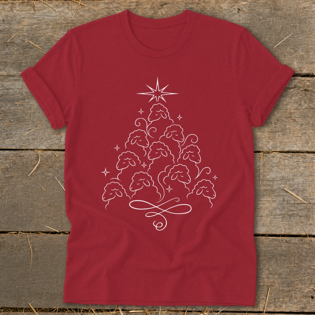 Red t-shirt with white sheep Christmas tree design and star.