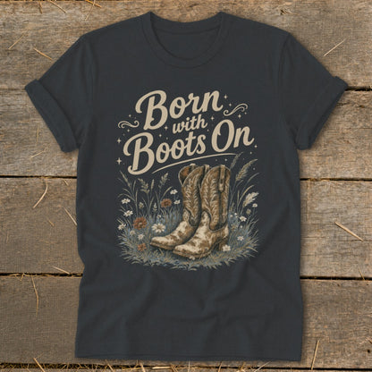 Dark grey t-shirt with "Born with Boots On" text and cowboy boots in flowers.