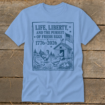T-shirt graphic with text "Life, Liberty, and the Pursuit of Fresh Eggs" and chickens.