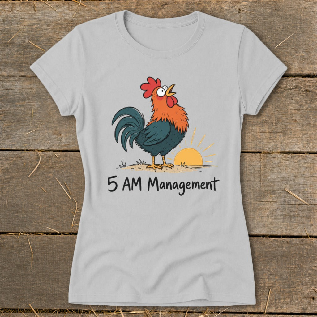 Light grey t-shirt with a cartoon rooster crowing at sunrise, text reads "5 AM Management".