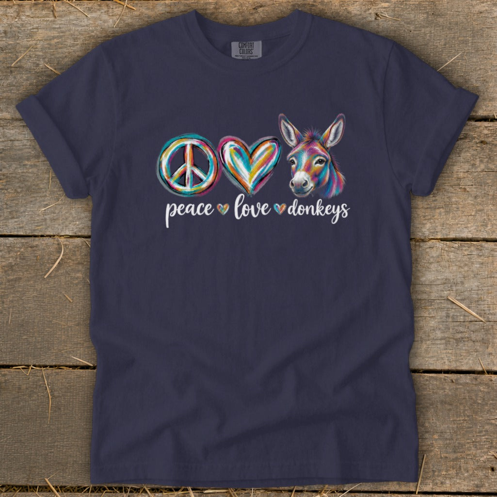 Navy t-shirt with peace sign, heart, and donkey graphic and text.