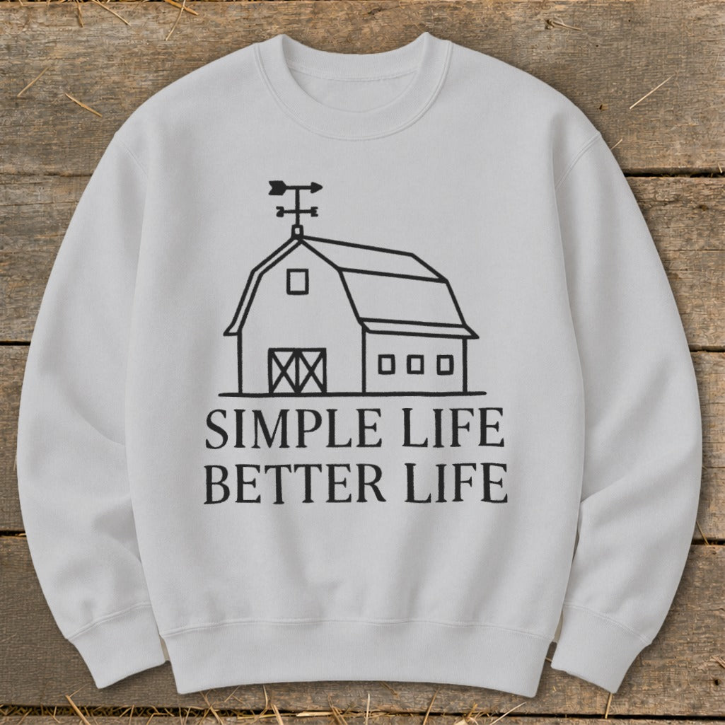 White sweatshirt with black barn graphic and text "SIMPLE LIFE BETTER LIFE."