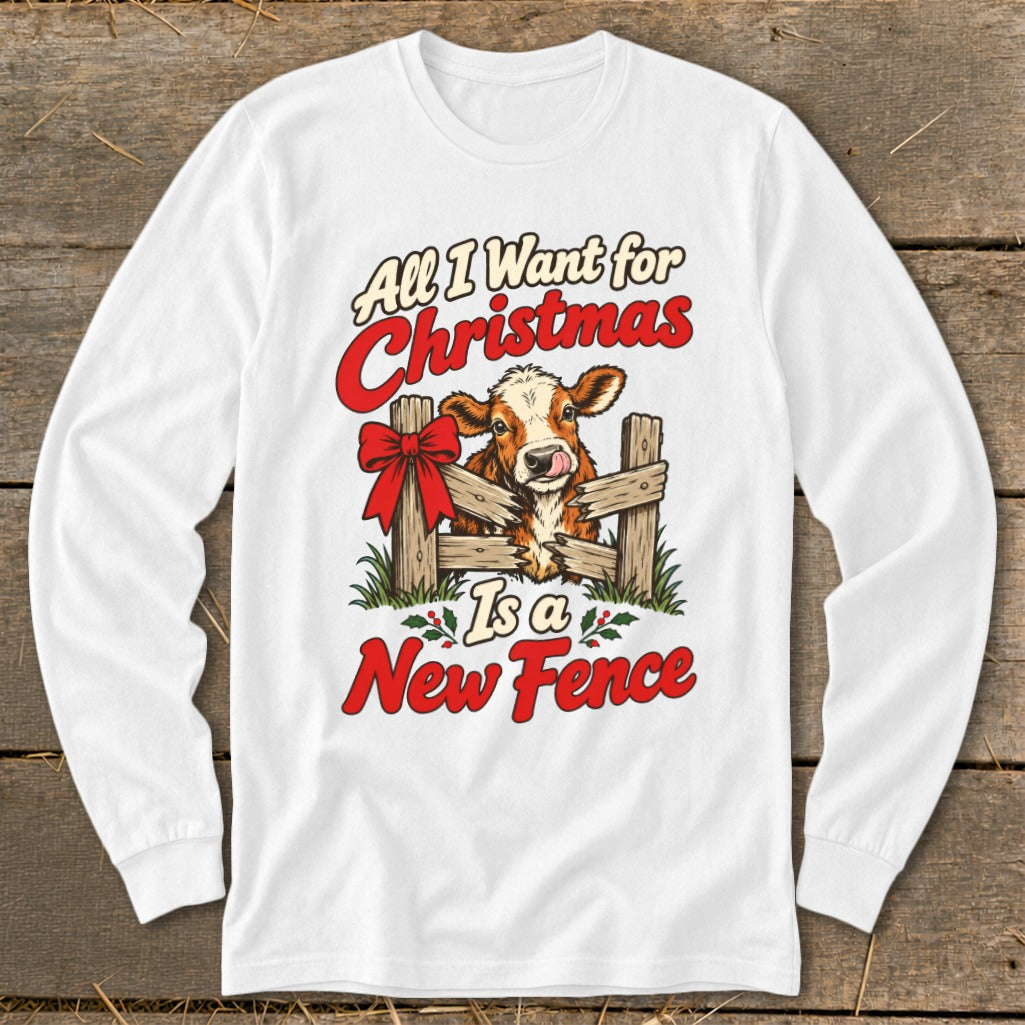 White long sleeve shirt with a cow and red text saying "All I Want for Christmas Is a New Fence."
