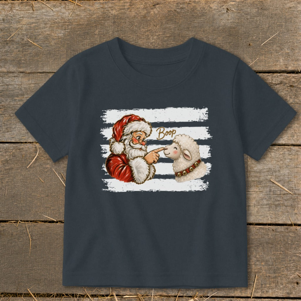 Santa booping a sheep with "Boop" written above, on a dark shirt.