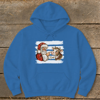 Santa boops a cow's nose with the word "Boop" on a blue hoodie.