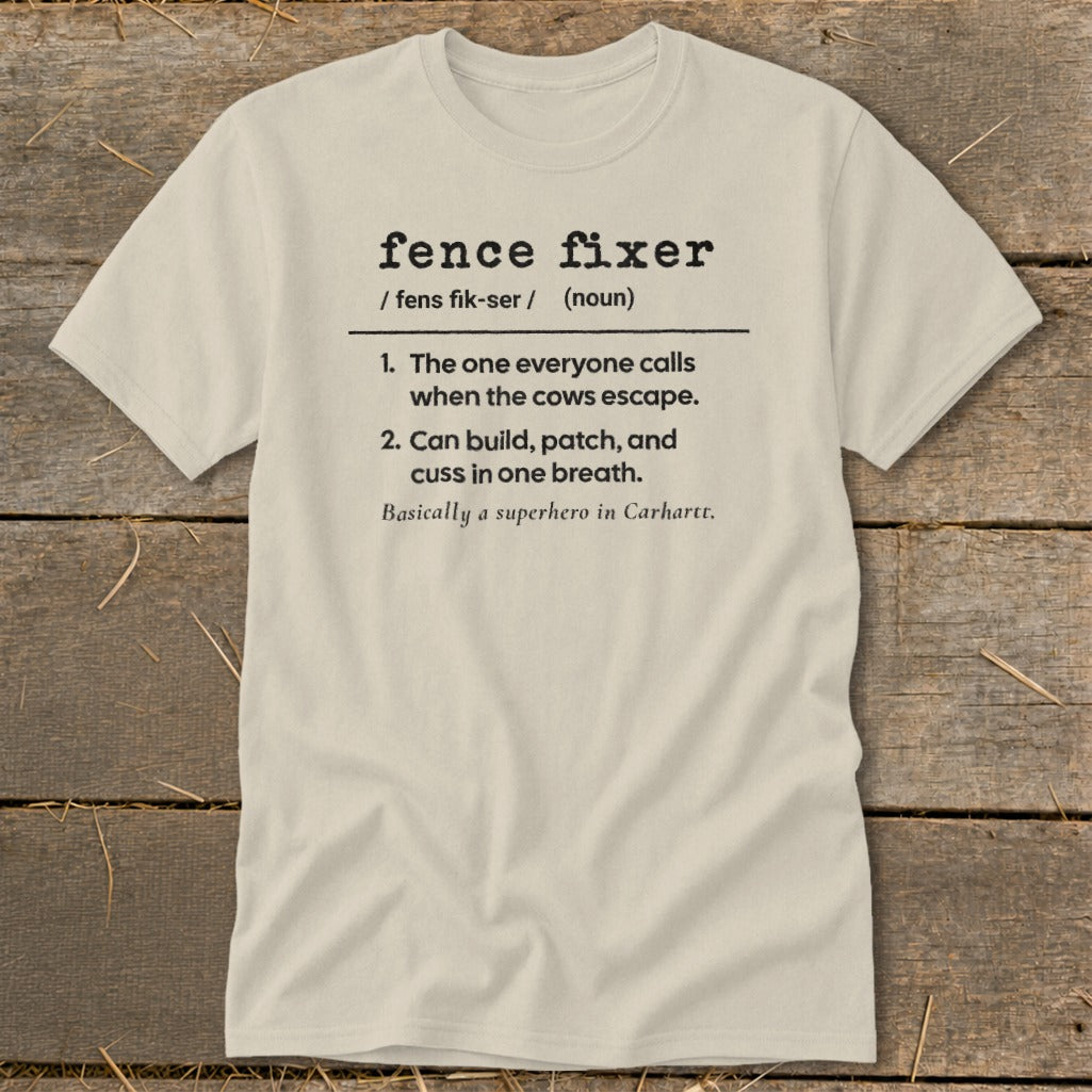 T-shirt with "fence fixer" definition: builds, patches, and cusses when cows escape.