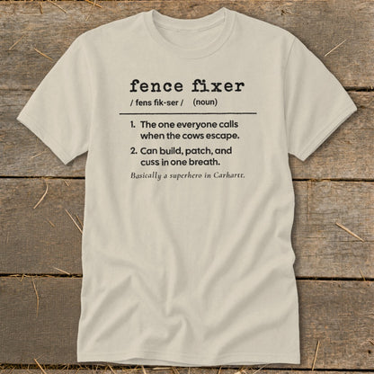 T-shirt with "fence fixer" definition: builds, patches, and cusses when cows escape.