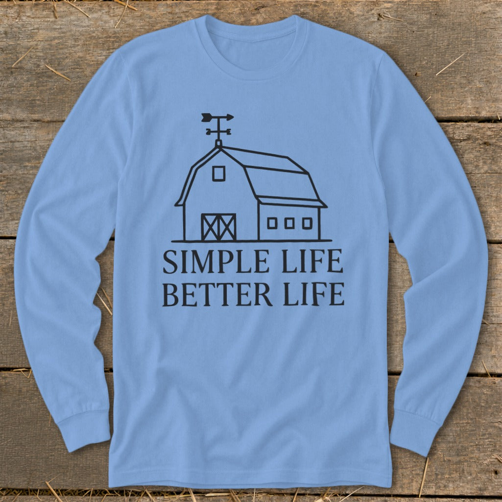 Light blue long-sleeve shirt with barn graphic and text "SIMPLE LIFE BETTER LIFE".