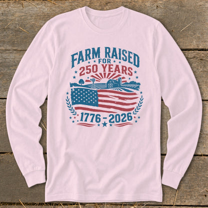 Farm raised for 250 years, 1776-2026 graphic on a light pink shirt.